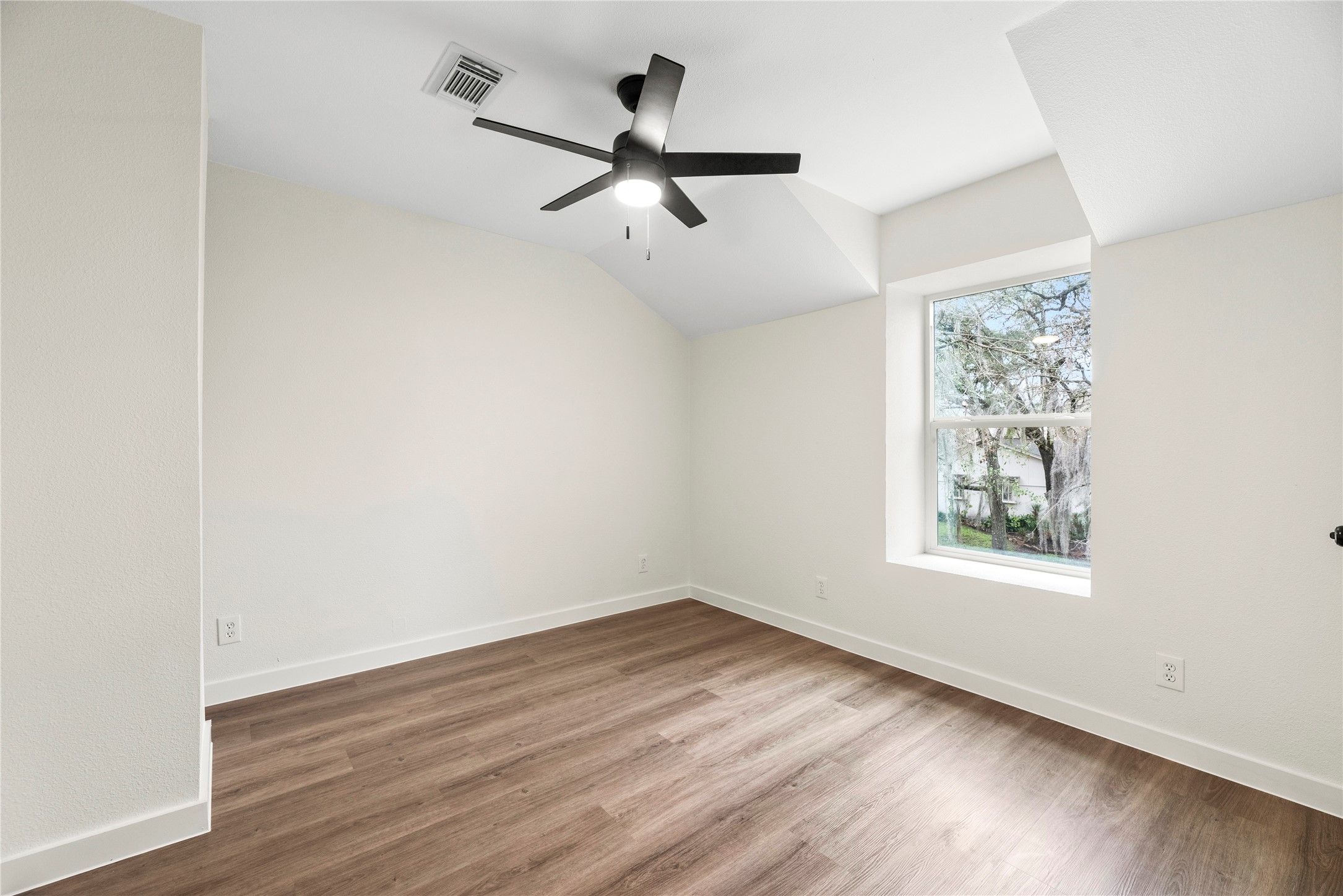 Upstairs secondary bedroom.
