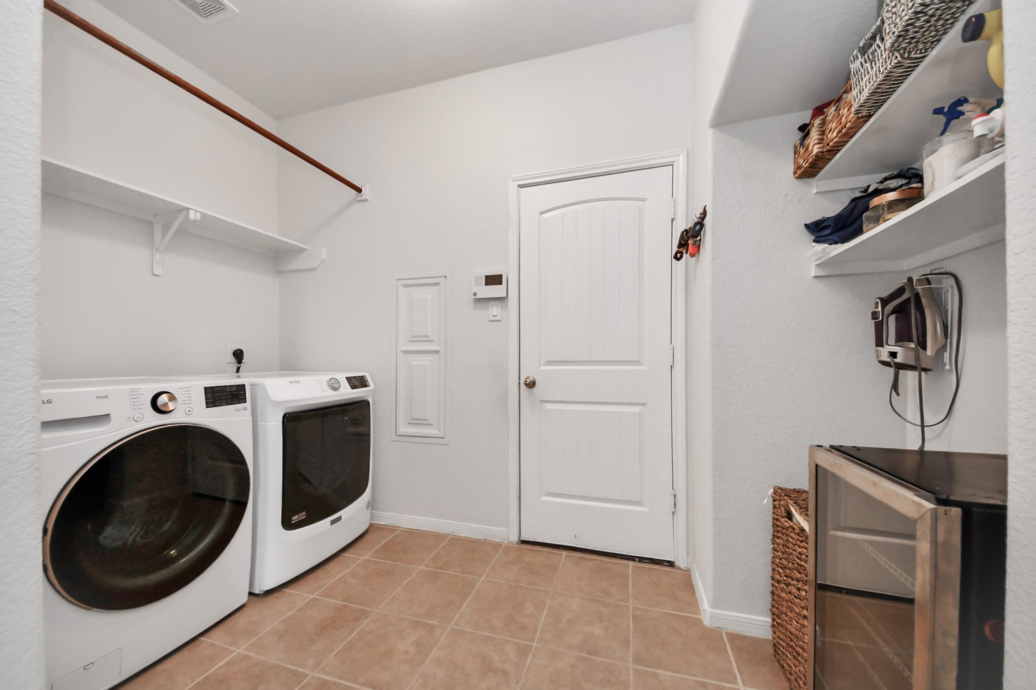 large utility room located inside the house