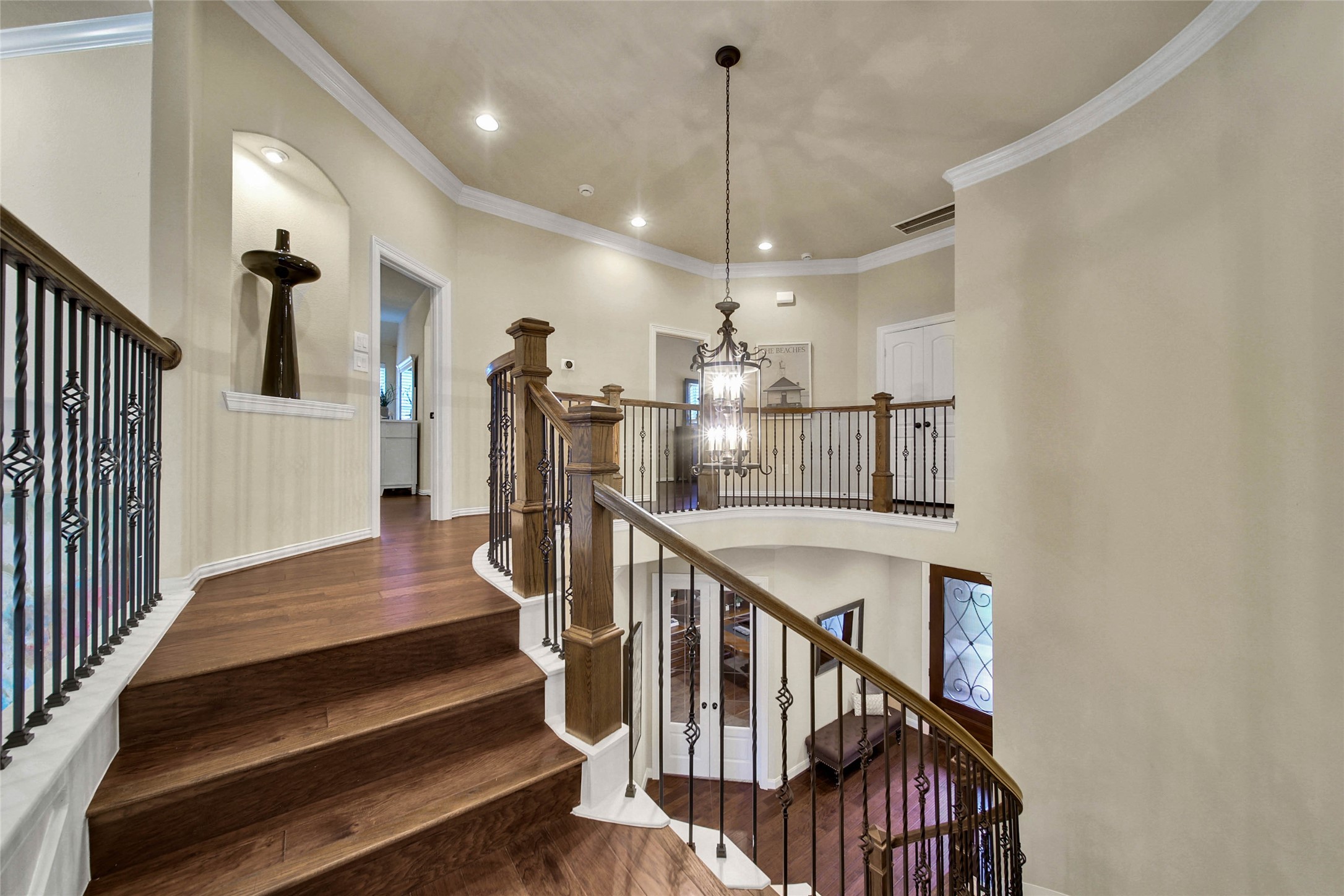 Ready to see the 2nd story?? Beautiful wood floors accentuate the graceful curves of the staircase and continue throughout the second floor.