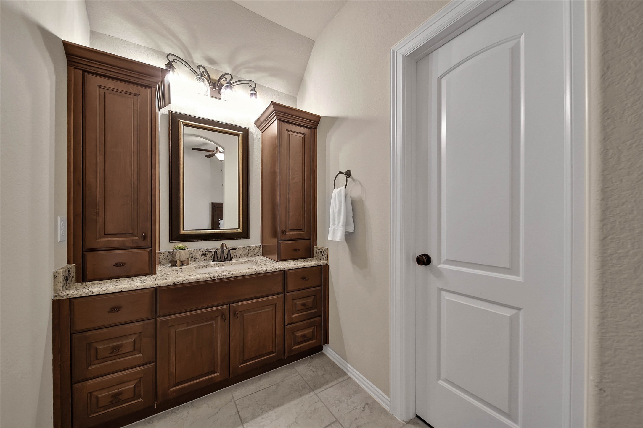 Beautiful design finishes continue throughout the upstairs bathrooms, while the private vanity area offers ample storage for linens, toiletries, and everyday essentials.