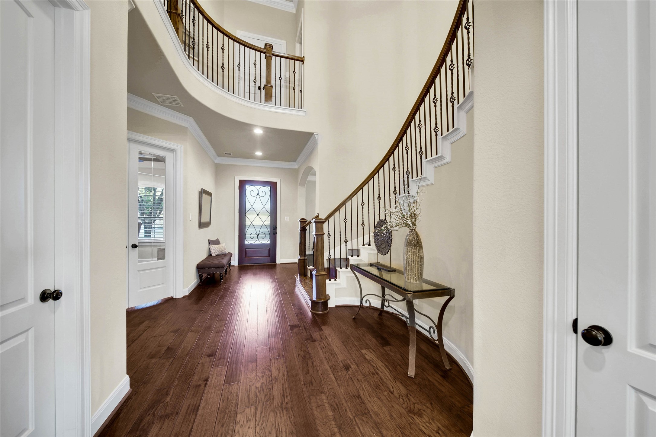 Rich hardwood floors warm the Entry and extend throughout the home.