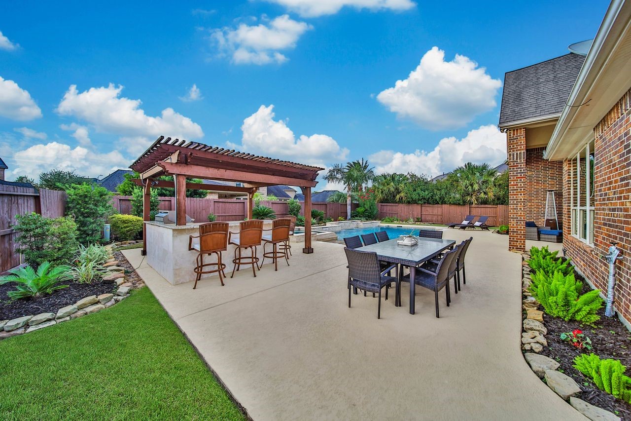 this backyard is an entertainers dream! Cookouts at your house!
This backyard is an entertainers dream, with the perfect setting for weekend cookouts, poolside gatherings, and making memories with family and friends!