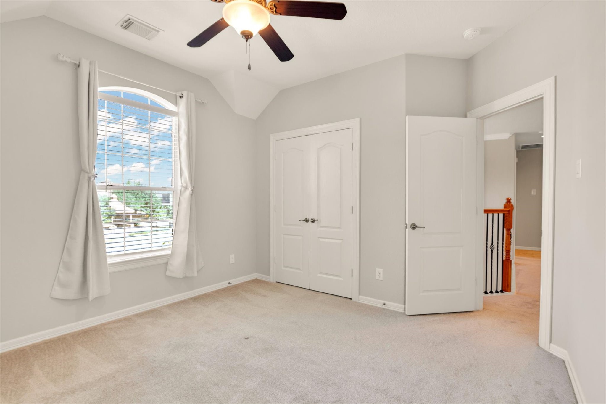 It includes double doors leading to a closet.