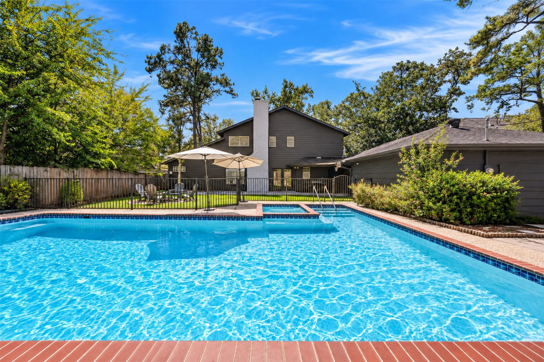 Pool & Spa: Enjoy resort-inspired outdoor living with a private in-ground pool, adjoining spa, and expansive poolside areas designed for relaxation and entertaining.