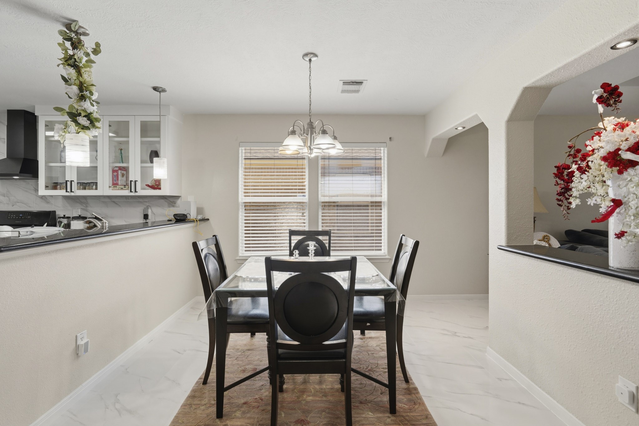 Open to the kitchen, the breakfast area keeps conversation flowing and makes daily routines feel easy and connected.