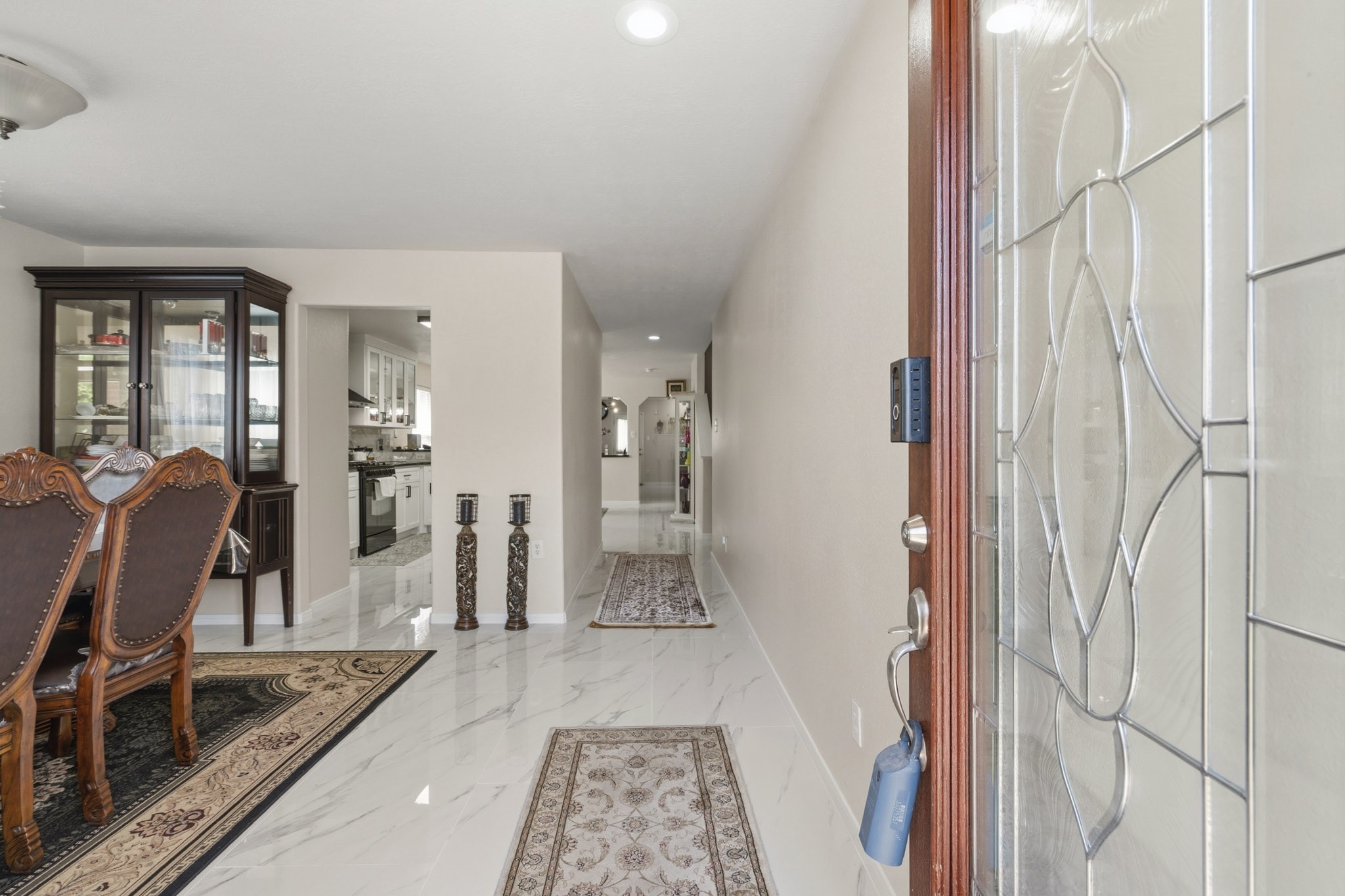 A bright, welcoming entry introduces the homes open layout and creates an easy flow toward the dining room and main living spaces. A bright, welcoming entry introduces the homes open layout and creates an easy flow toward the dining room and main living spaces.