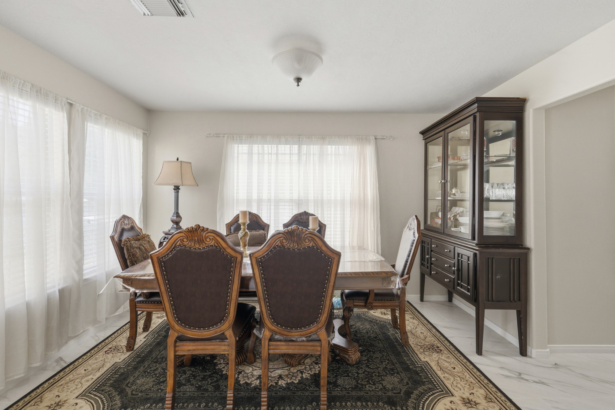 Bright windows and a generous layout make this dining room a welcoming setting for meals, celebrations and memorable conversations. Bright windows and a generous layout make this dining room a welcoming setting for meals, celebrations and memorable conversations.
