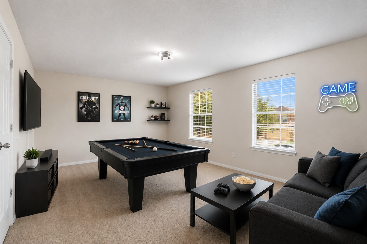 The oversized game room offers plenty of space for movie nights, games, hobbies or a comfortable second living area. *Virtually staged*