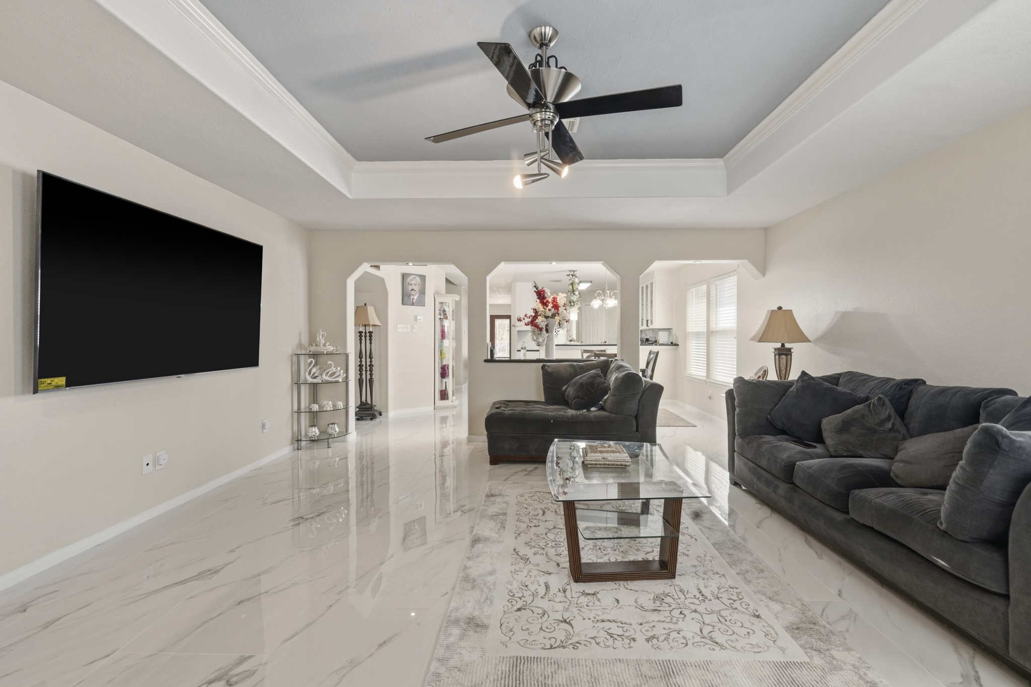 The family room connects easily to the surrounding living spaces, creating a natural flow for hosting and daily routines.