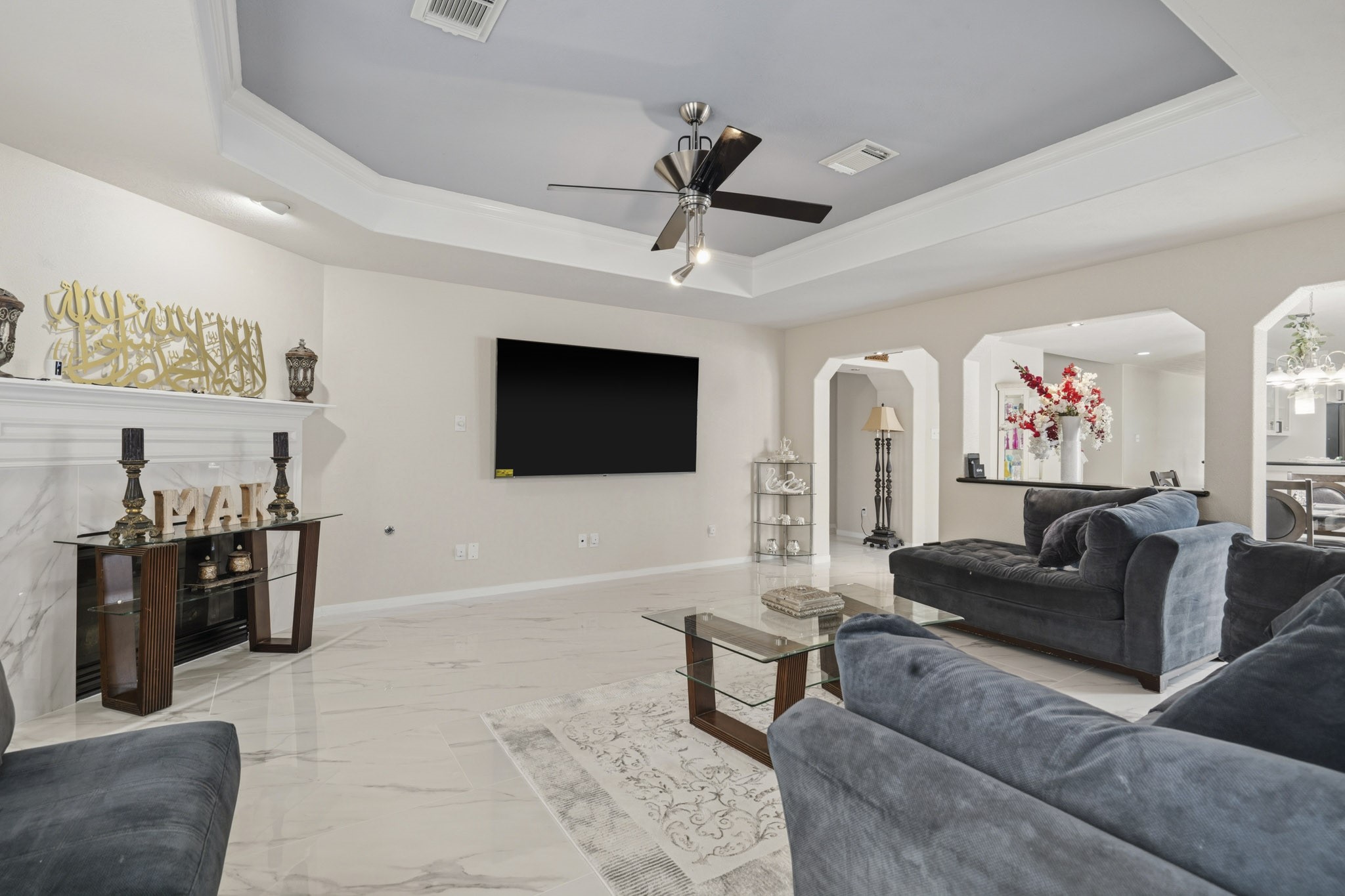A generous layout makes it easy to create multiple seating areas while still keeping the room open and comfortable.