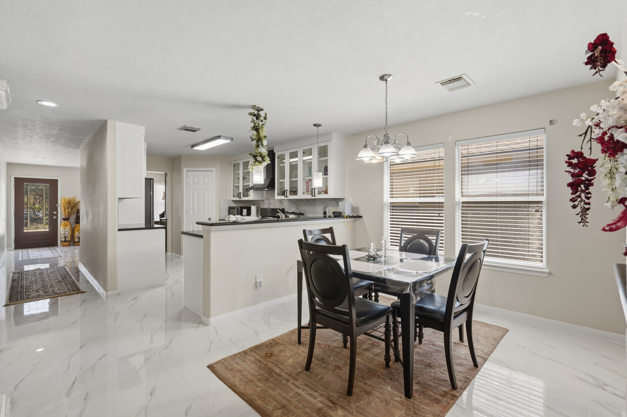 The cheerful breakfast area sits just off the kitchen, creating a convenient spot for casual meals, homework or morning coffee. The cheerful breakfast area sits just off the kitchen, creating a convenient spot for casual meals, homework or morning coffee.