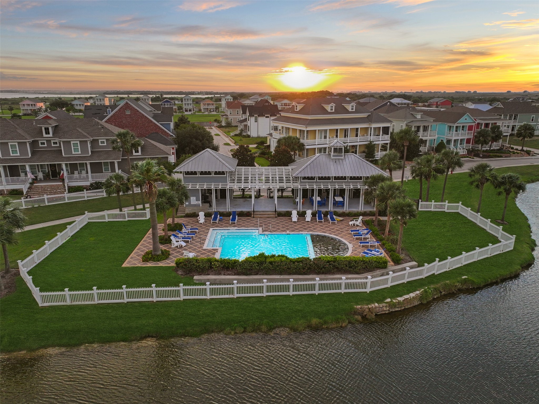 Not just your average community pool. This refreshing pool is situated lakeside with breathtaking views all around. Cabanas provide refuge from the Galveston sun and a place to dine pool side. This is a short golf cart drive away from your townhome.