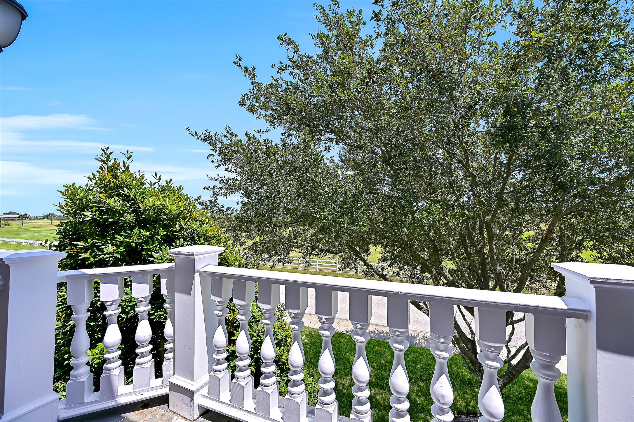 Peeks of golf course views from the private balcony from the 3rd bedroom.