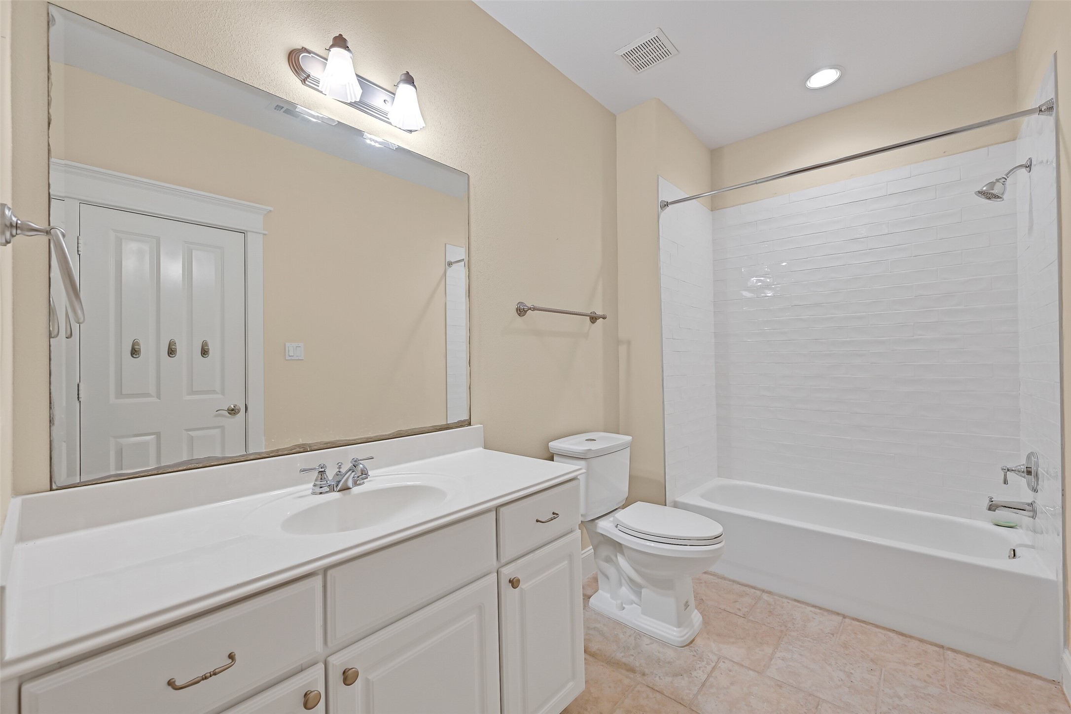 Shared bathroom on the 2nd level offering a tub/shower combination.