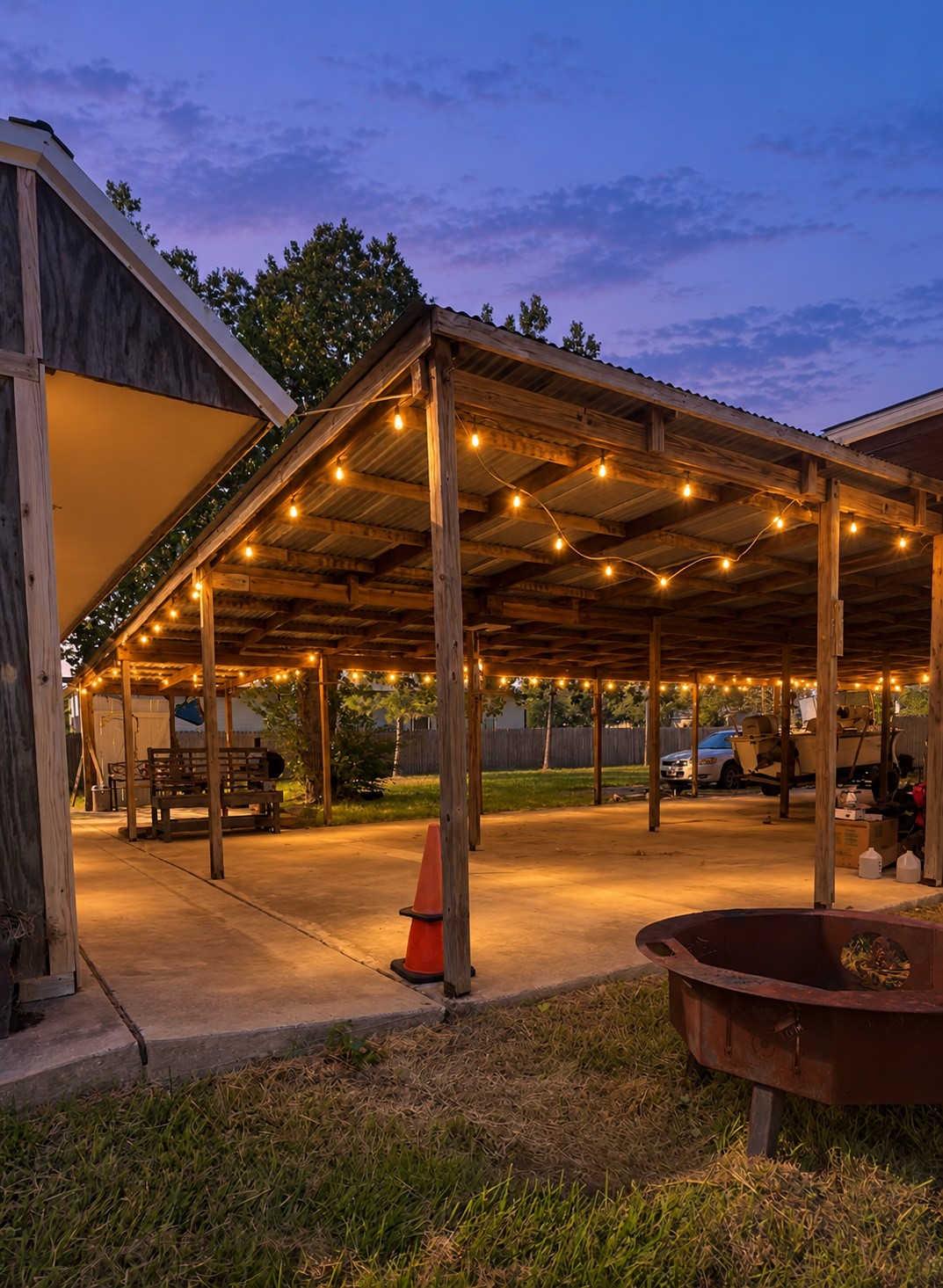 Covered patio digitally enhanced with AI to simulate twilight