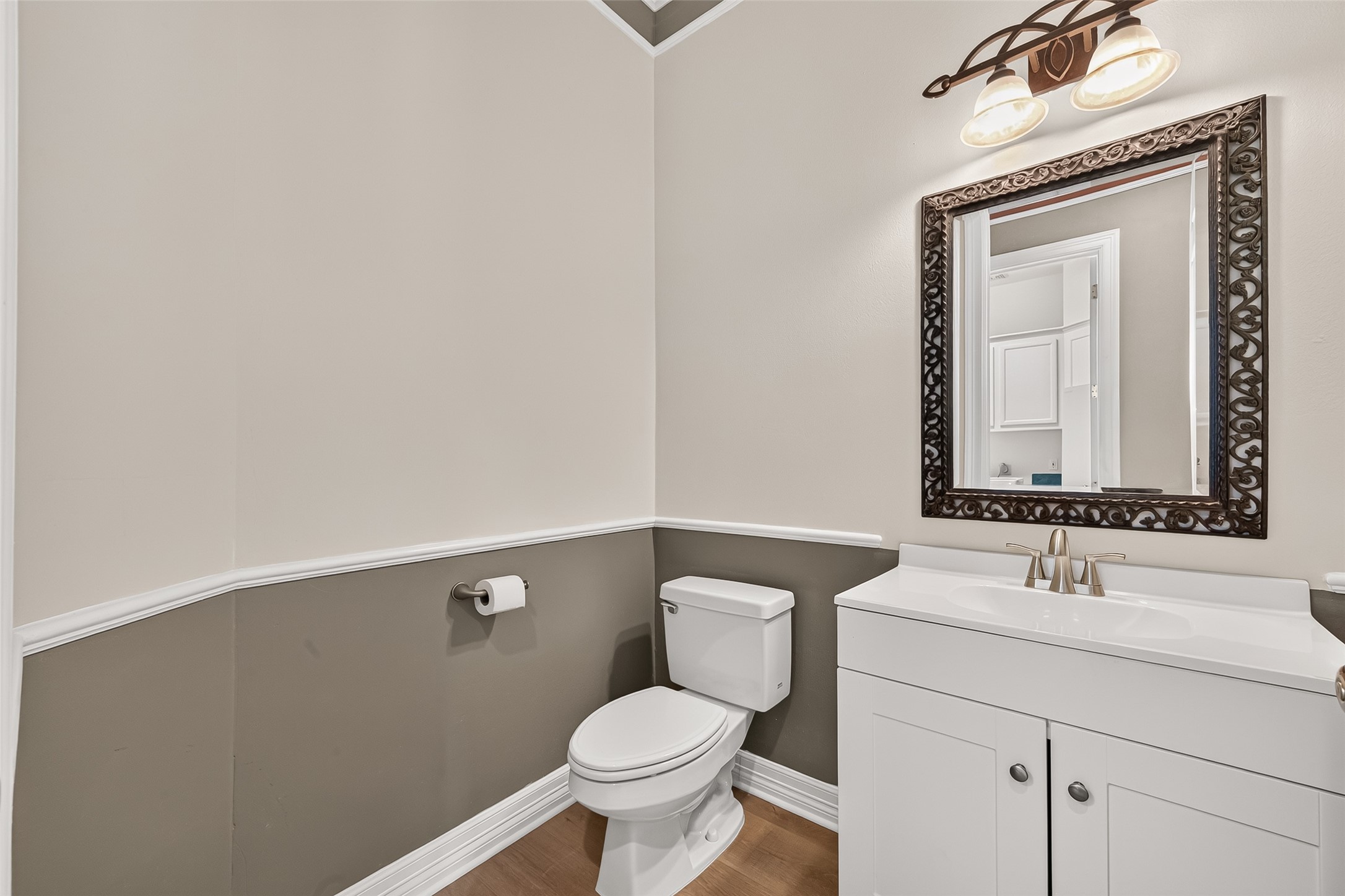 Updated powder bath off the kitchen area.