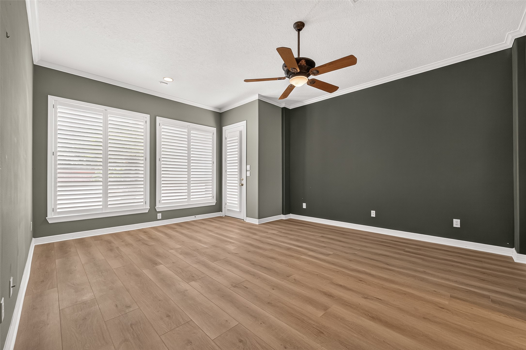 Spacious owner's retreat with a door giving you direct access to the backyard