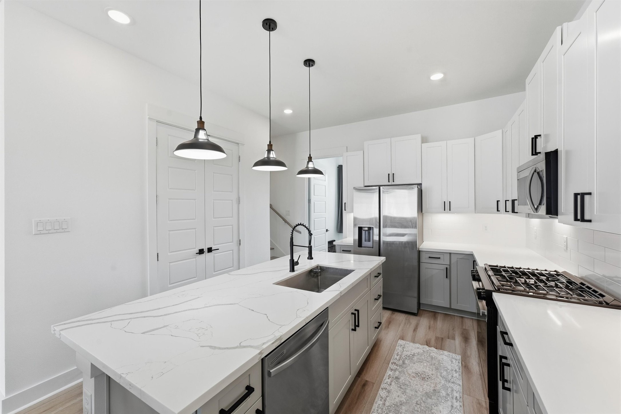 Large kitchen island with plenty of prep space and room for seating.