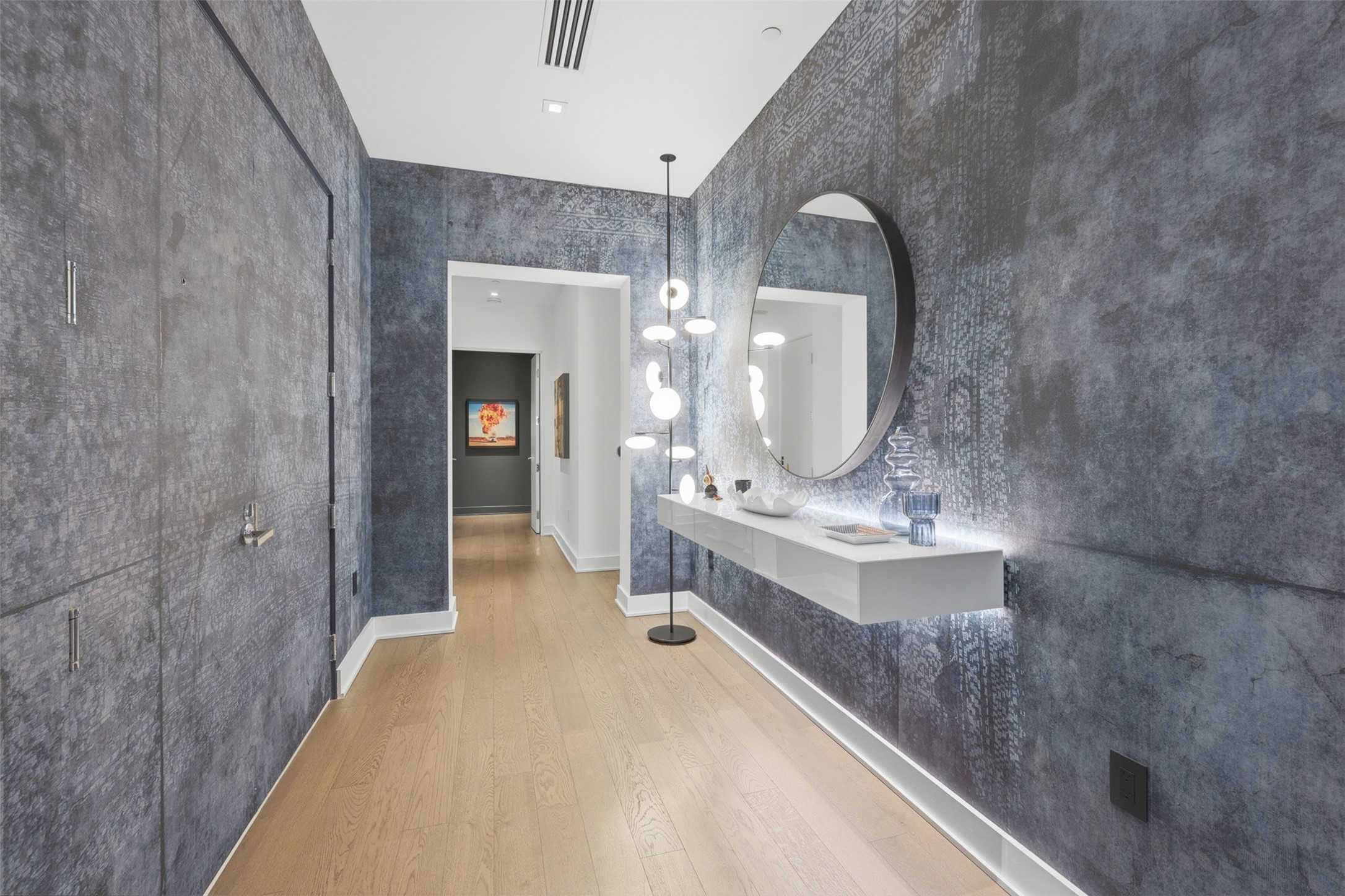 A grand double door entry and foyer welcome you home.