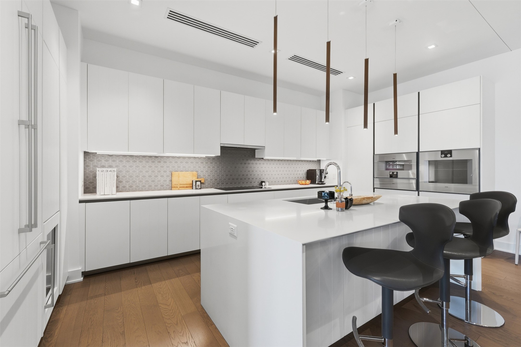 Giorgetti kitchen finishes including a Gaggenau appliance package.
