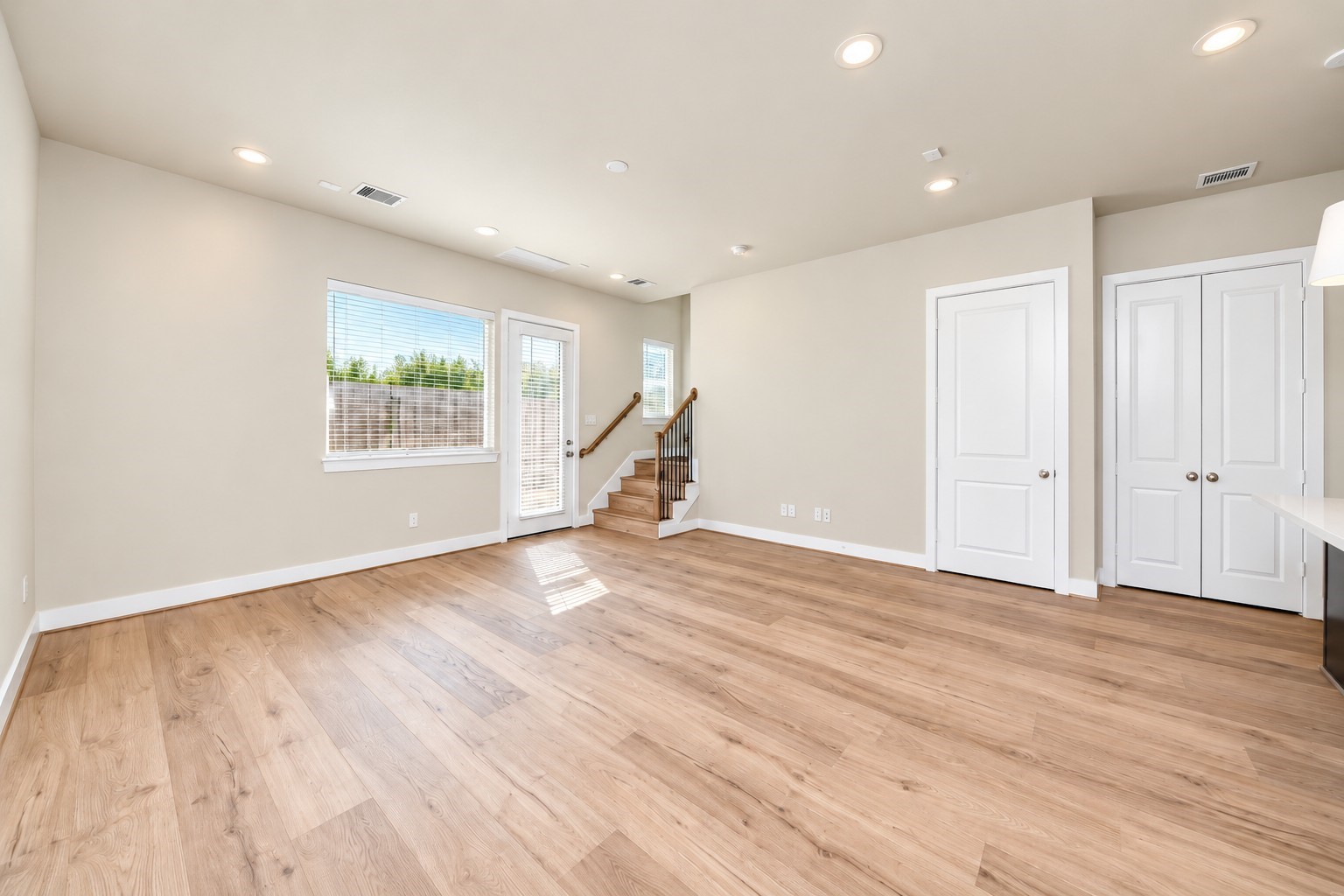 First floor living with large storage closet under the stairs. First floor living with large storage closet under the stairs.