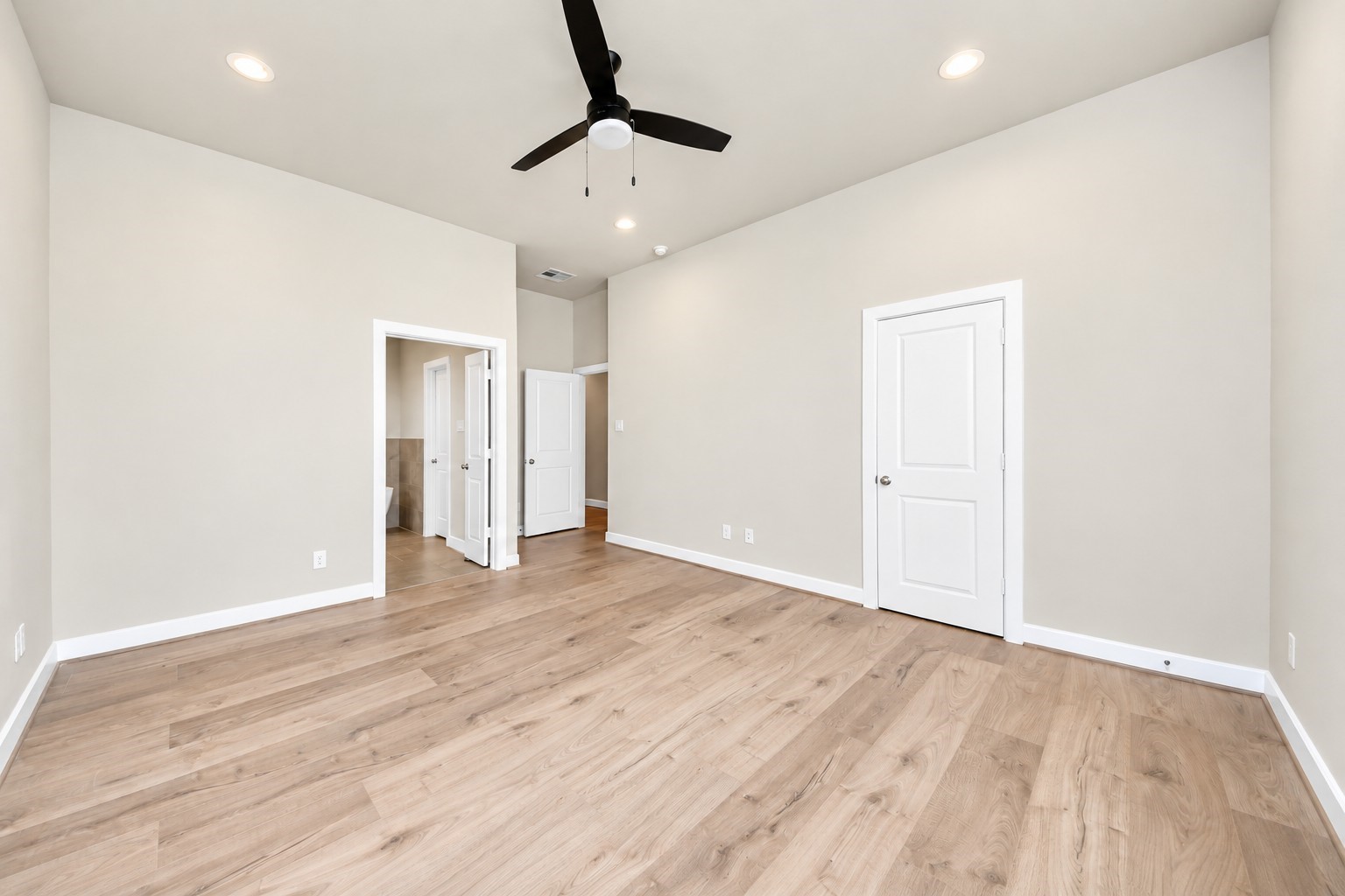Another view of the primary bedroom
