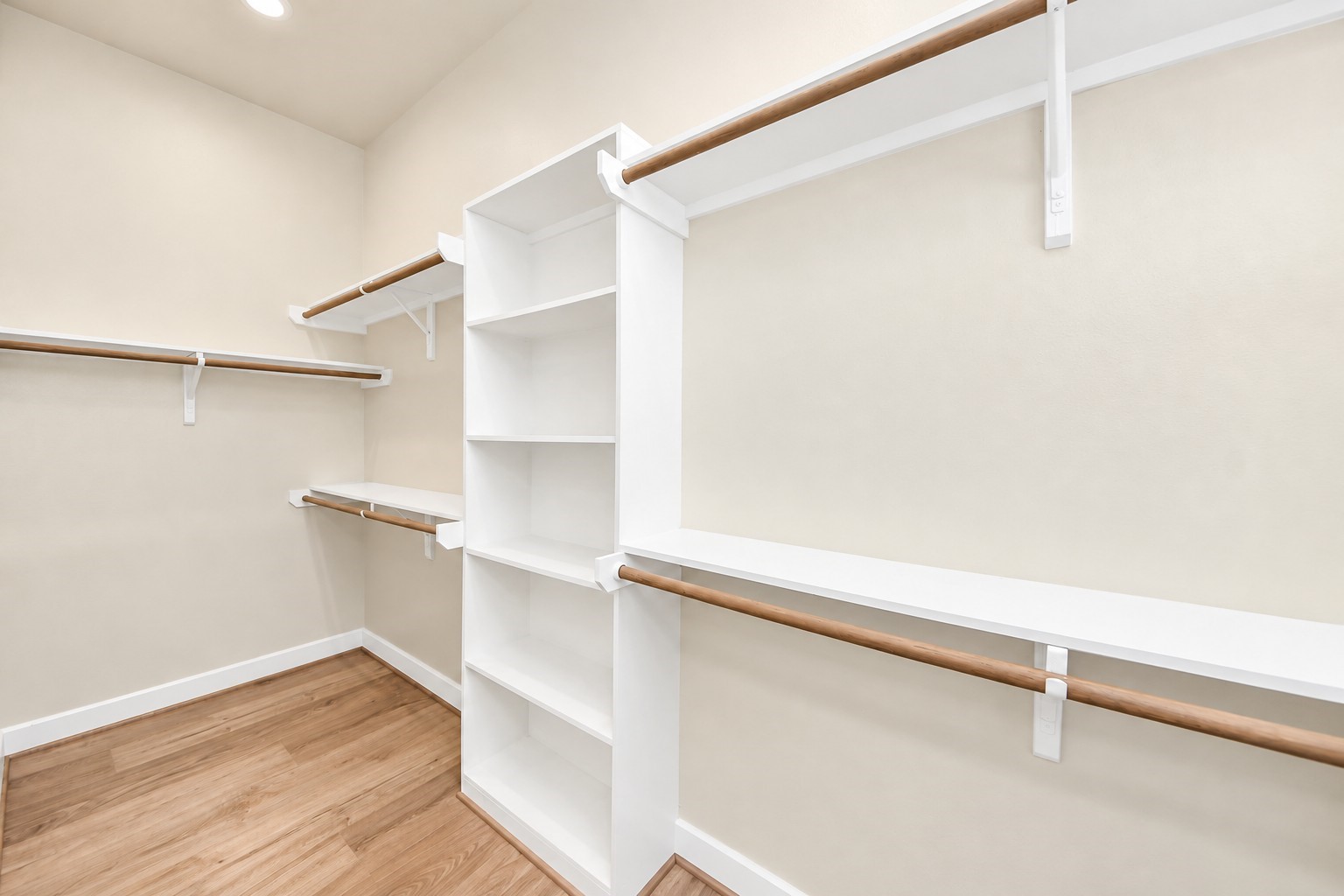 Primary walk-in closet.