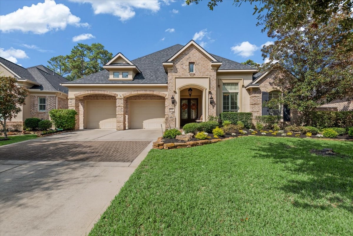 Brick and stucco exteriors give the entire neighborhood a cohesive, sophisticated design.