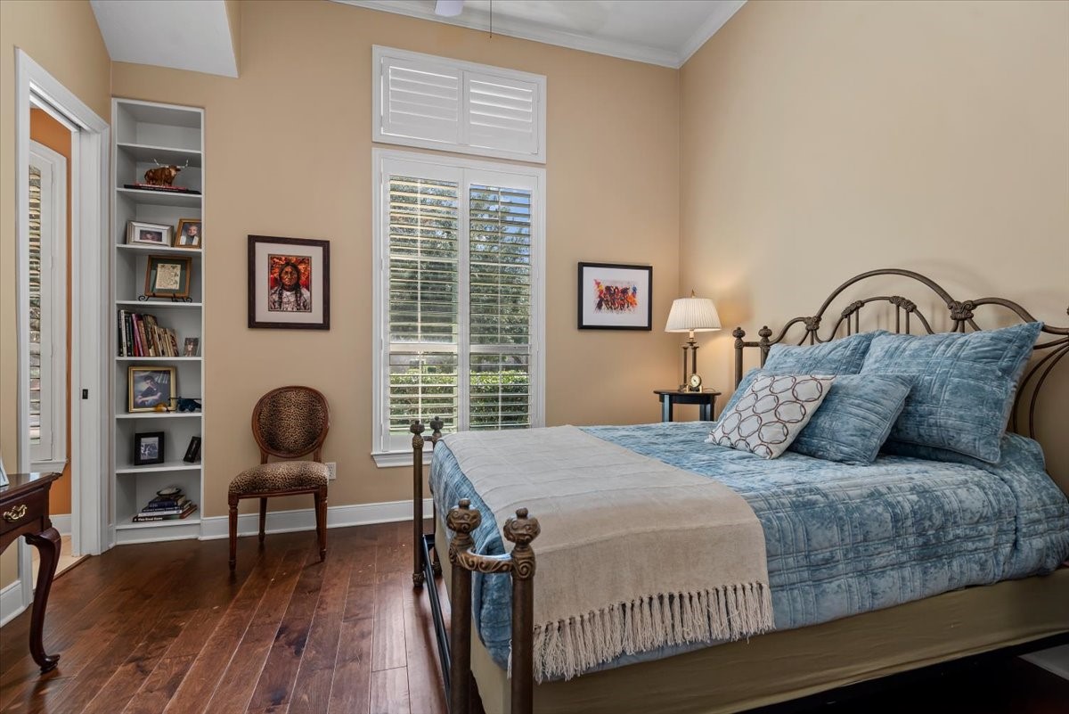 Bedroom #2 also has hardwood floors and a handy built-in bookshelf.