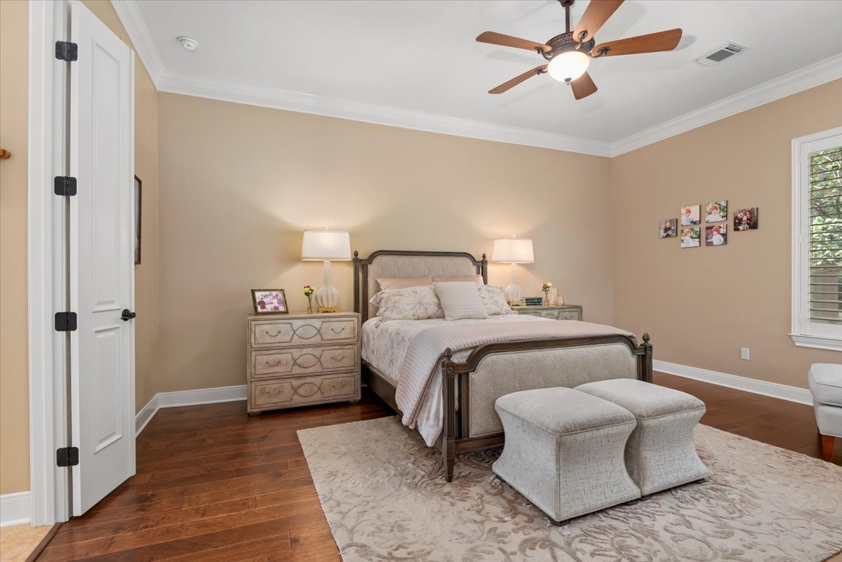 Double doors open to the primary bedroom.