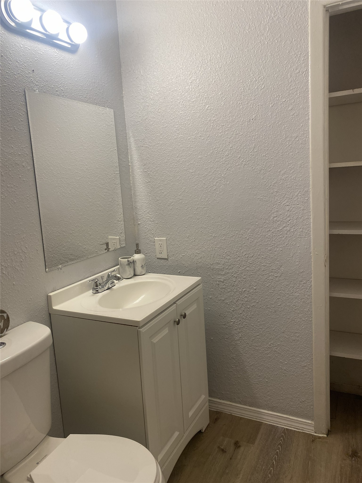 Bathroom offers plenty of storage Bathroom offers plenty of storage