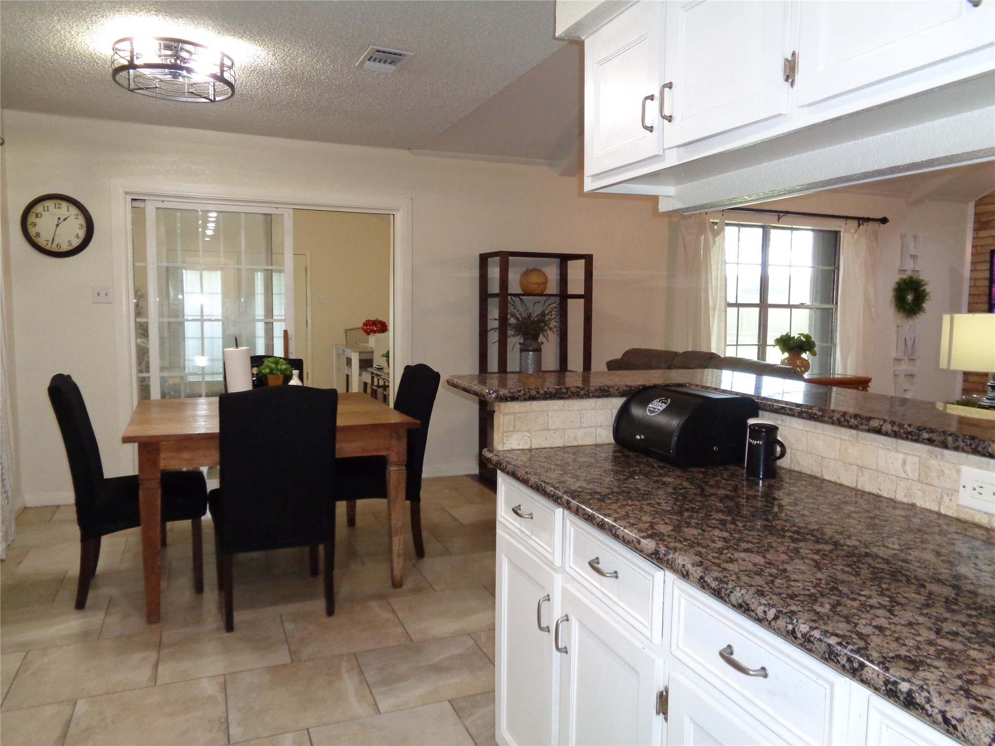 Breakfast area is open to the kitchen, family room and bonus room
