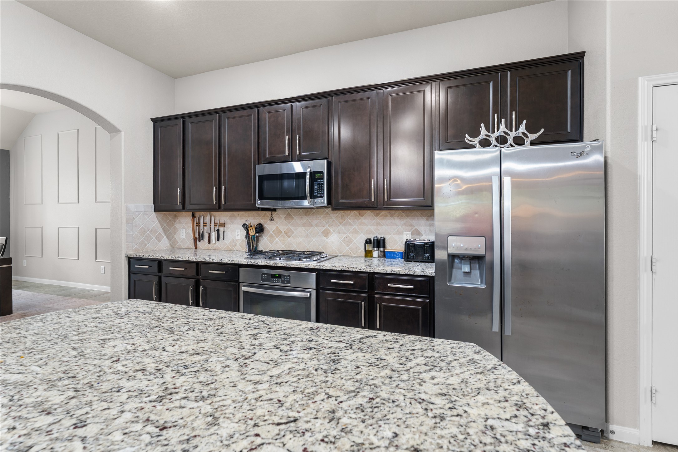 Functional kitchen layout featuring ample counter space and storage.