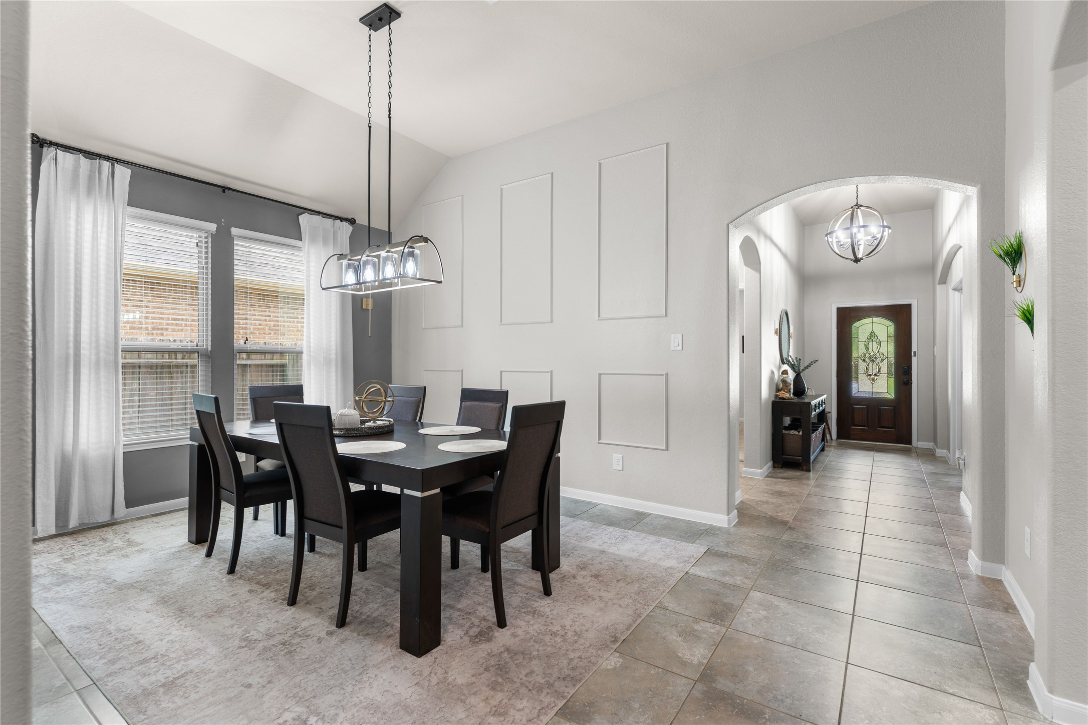 Bright formal dining room with natural light and elegant finishes for everyday meals or entertaining. Bright formal dining room with natural light and elegant finishes for everyday meals or entertaining.