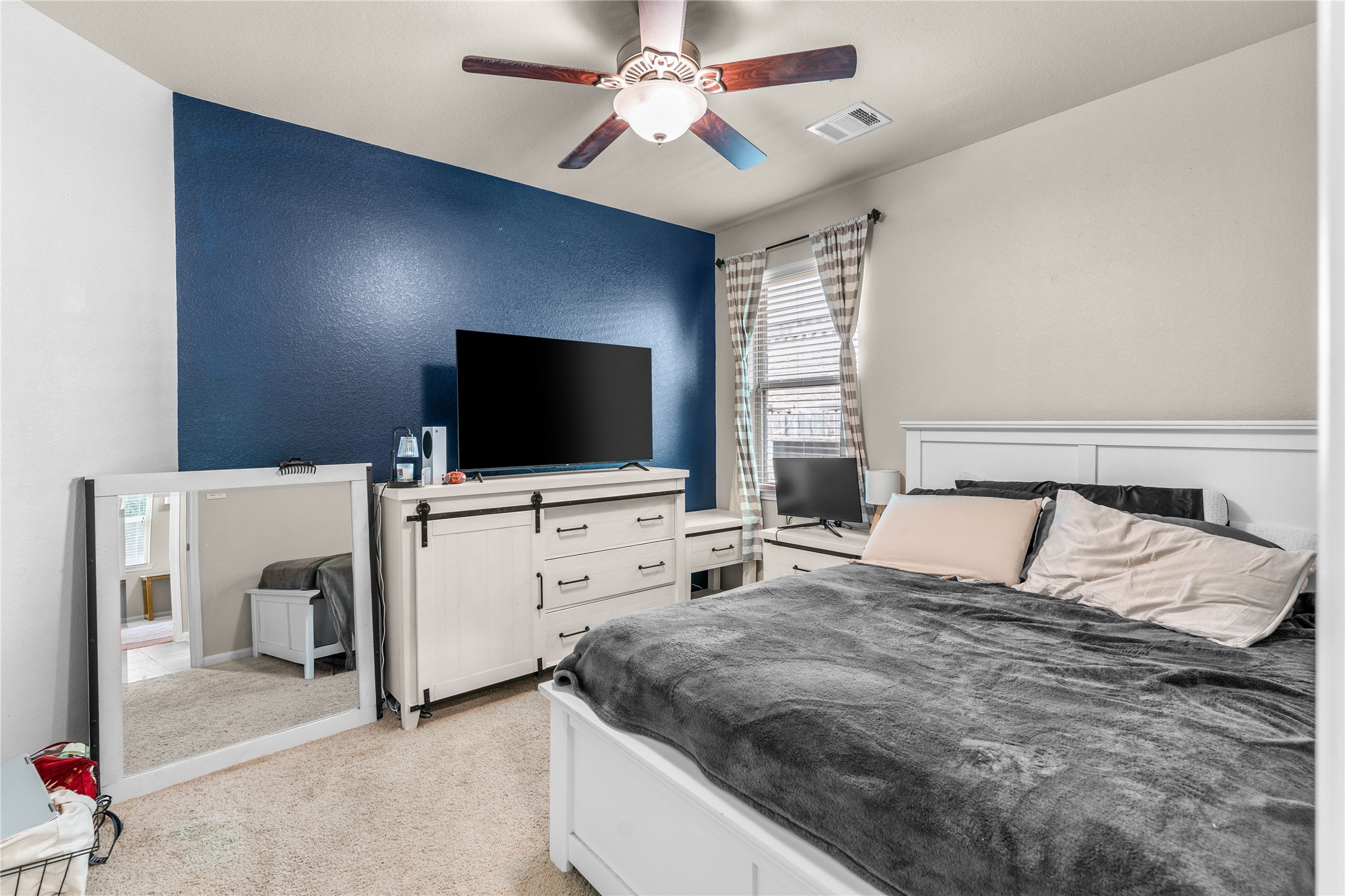 Spacious bedroom with easy access to nearby bathroom