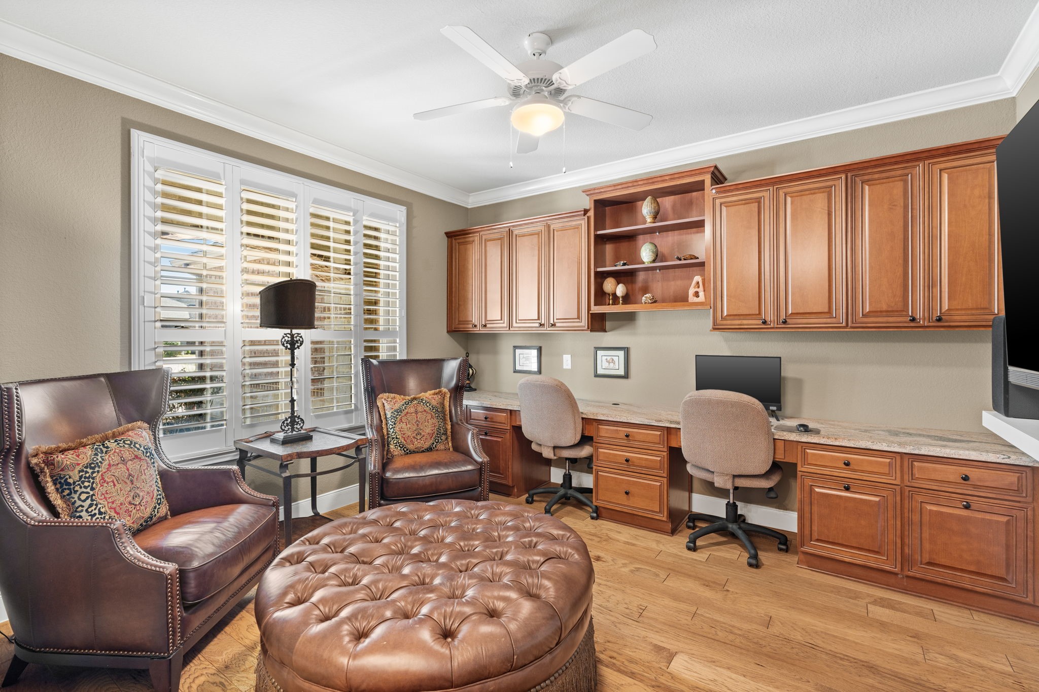Enjoy beautiful natural scenery and watch hummingbirds dance around the garden this time of year - The study/office has custom built in cabinets, shelves and crown molding.