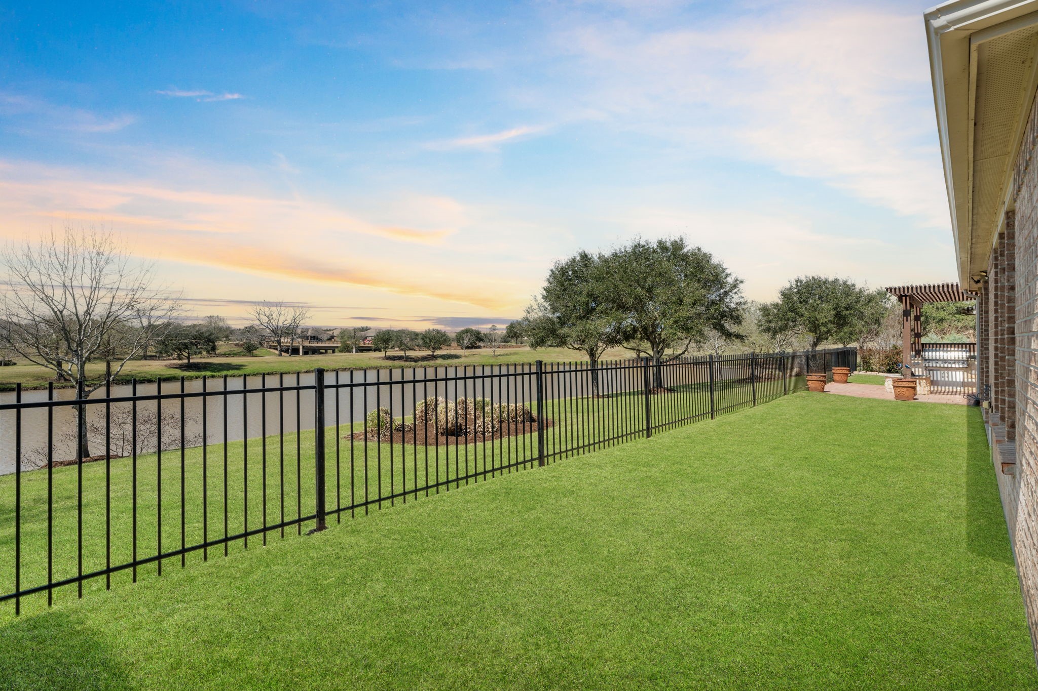 The lush greenery frames the peaceful waters, creating an idyllic scene that's straight out of a postcard.