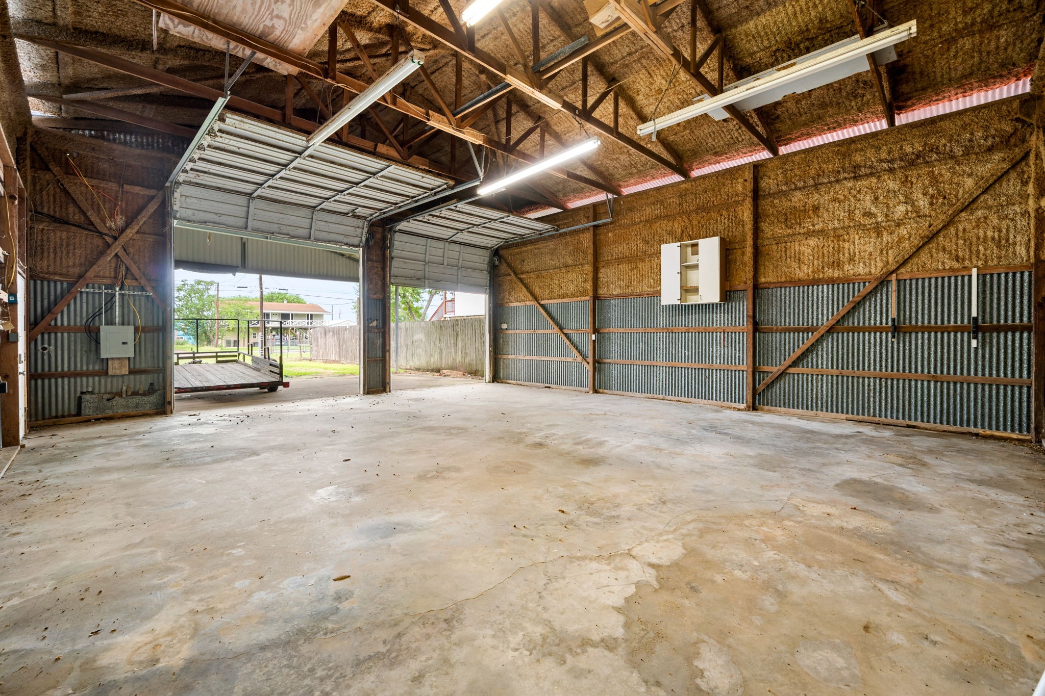 This property features a 30x30 garage that is capable of storing a boat or RV with 14ft eaves and 12ft garage doors. This property features a 30x30 garage that is capable of storing a boat or RV with 14ft eaves and 12ft garage doors.