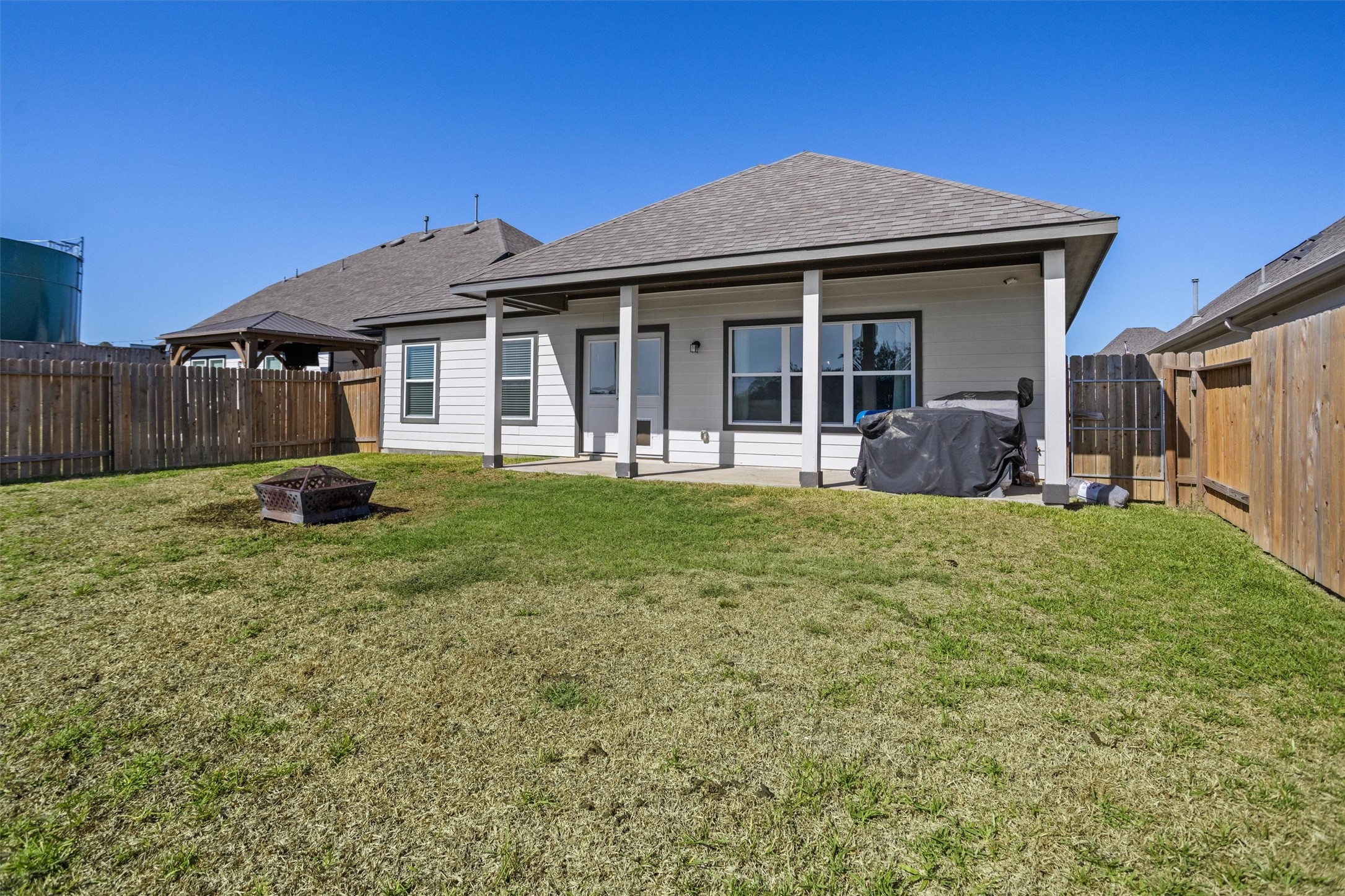 Large yard with a water view.