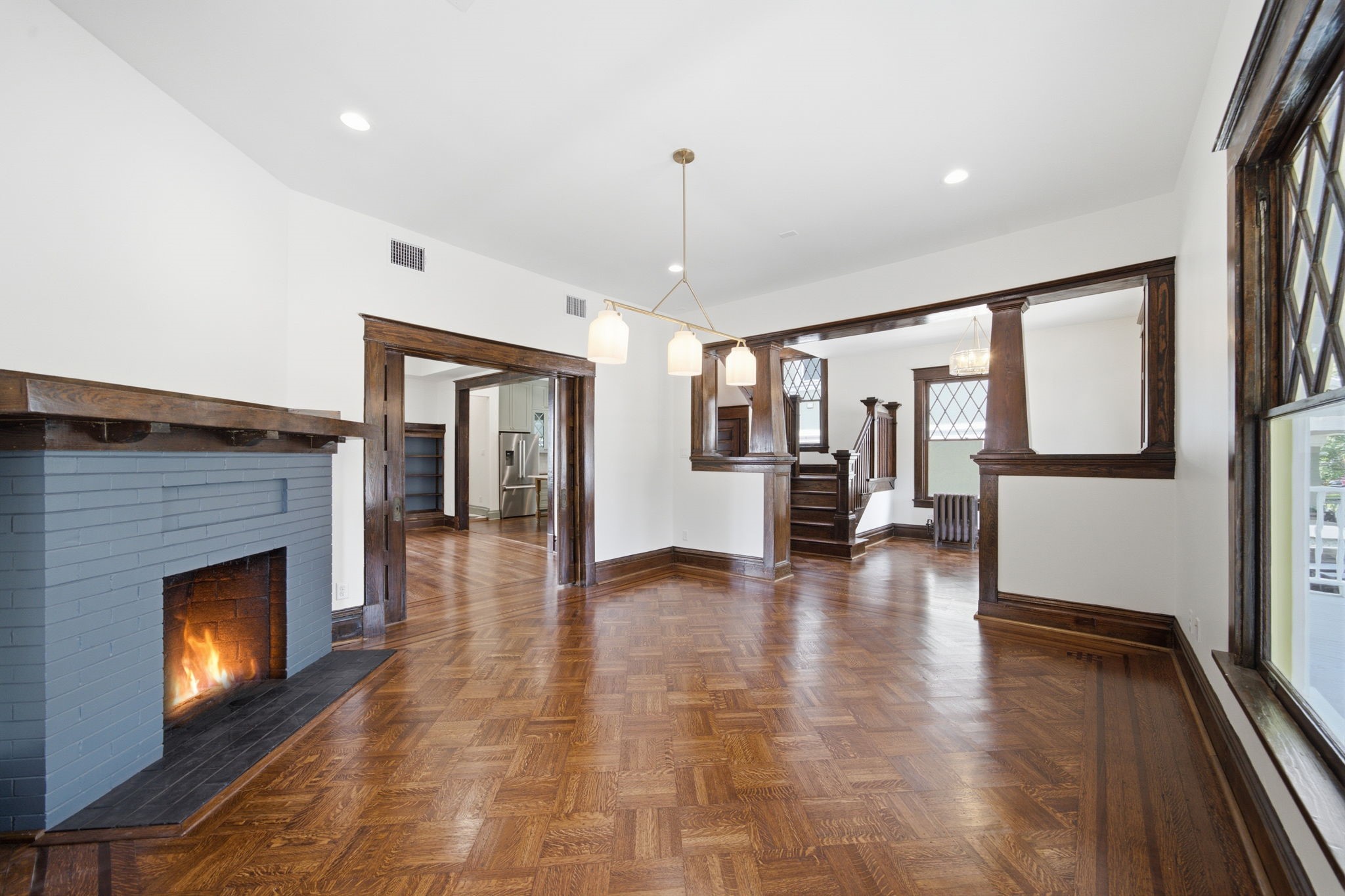 The dining room features the original sliding pocket doors that can add privacy to both the dining and living spaces.