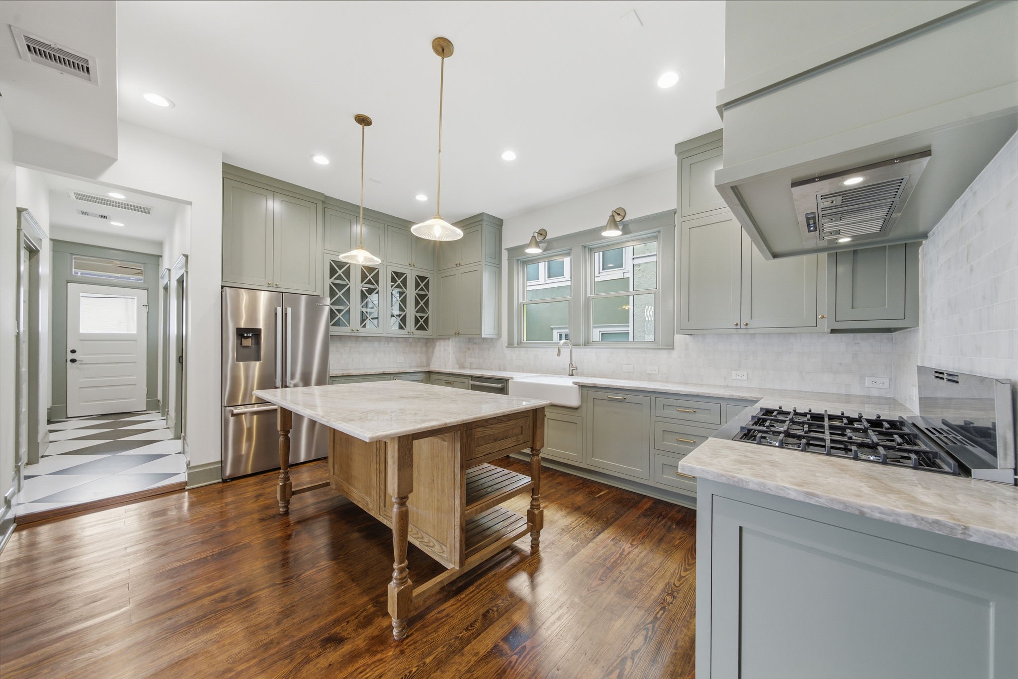 Kitchen includes all Bosch appliances and farm style sink.