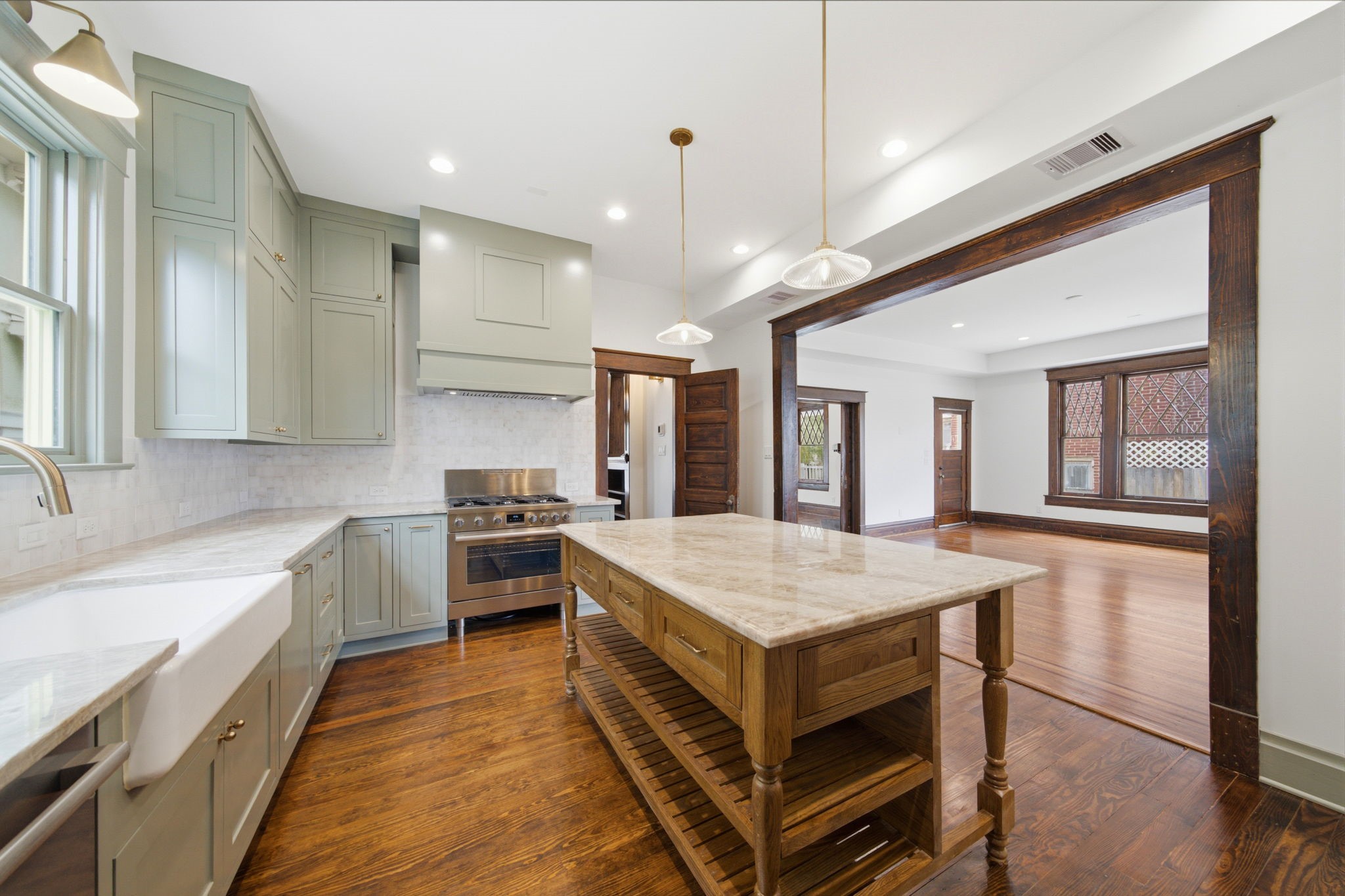 The open layout flows seamlessly from the kitchen into the living area allowing for an excellent area to host friends and family.