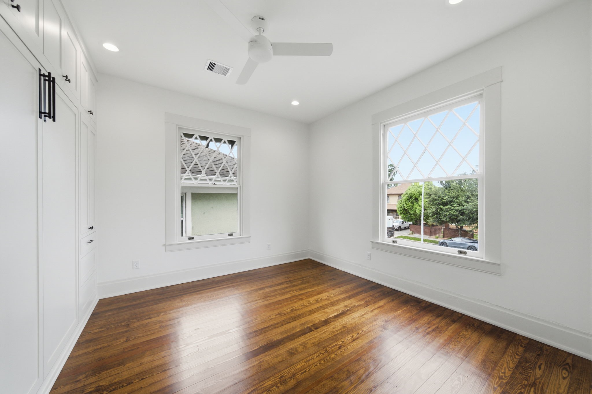 Bright, airy room with original restored pine floors.