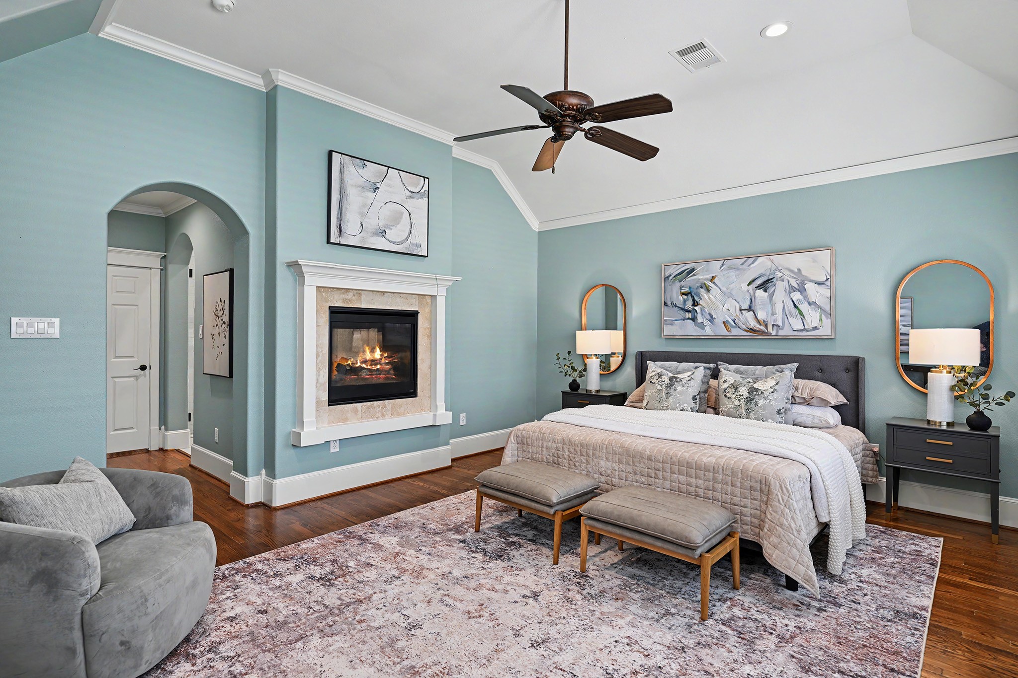 Double-sided fireplace of the primary for the bedroom/bathroom.