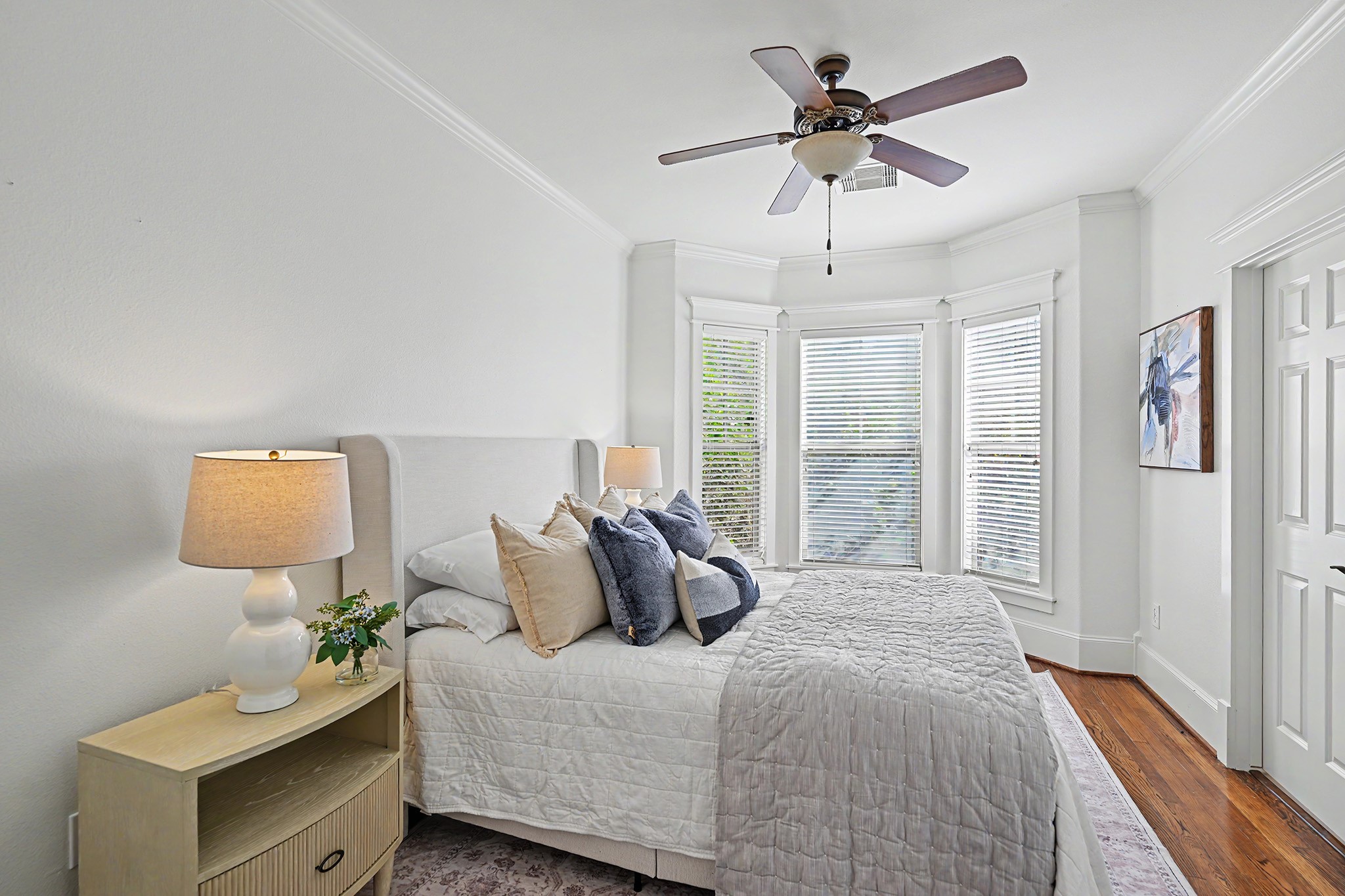 First of the secondary bedrooms gives you a treehouse feel with walk-in closet and direct access to the Hollywood bathroom.