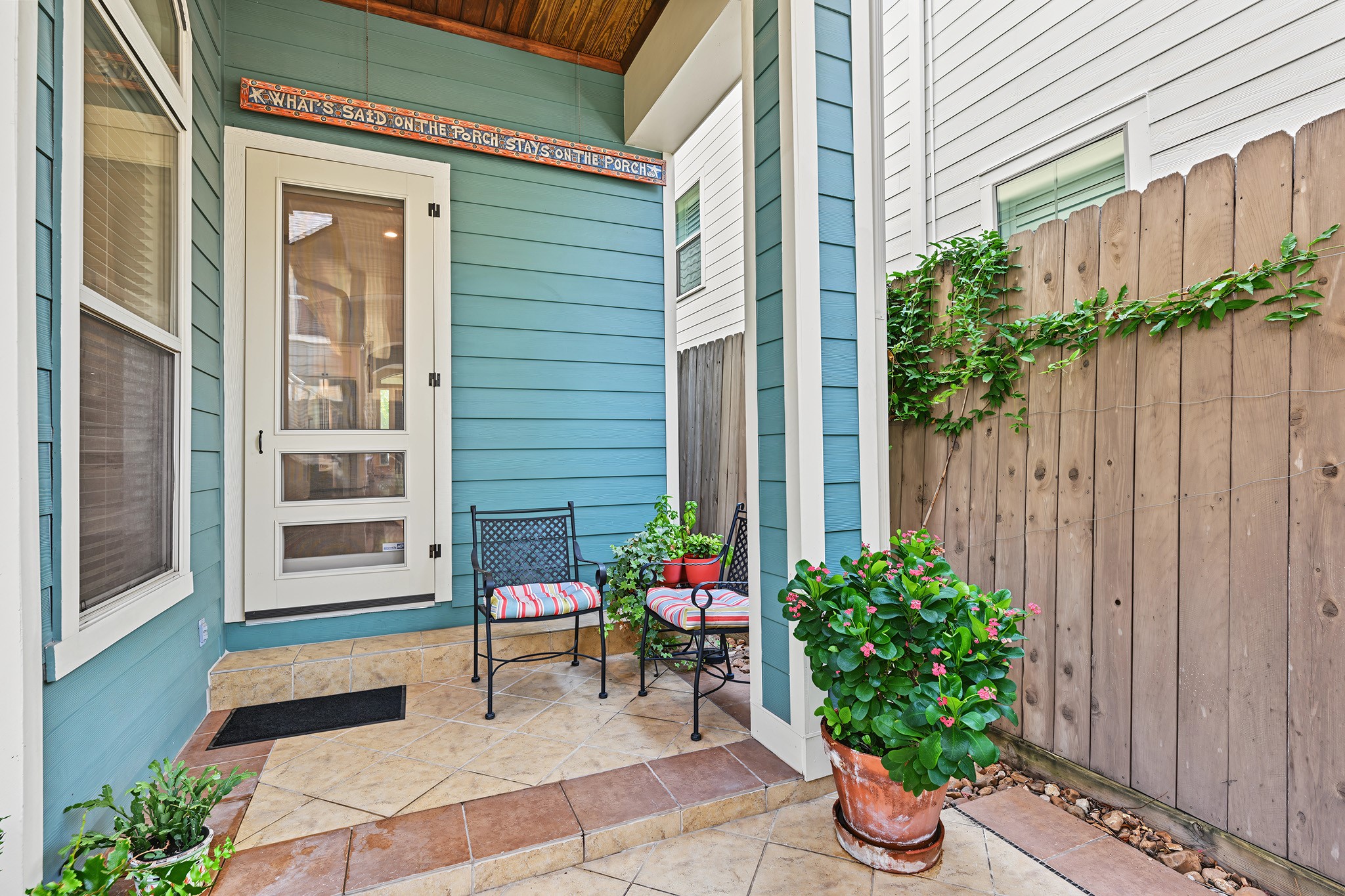 Patio sitting area with custom-made screen door. Dedicated gas-line in place to make BBQ grilling a breeze.