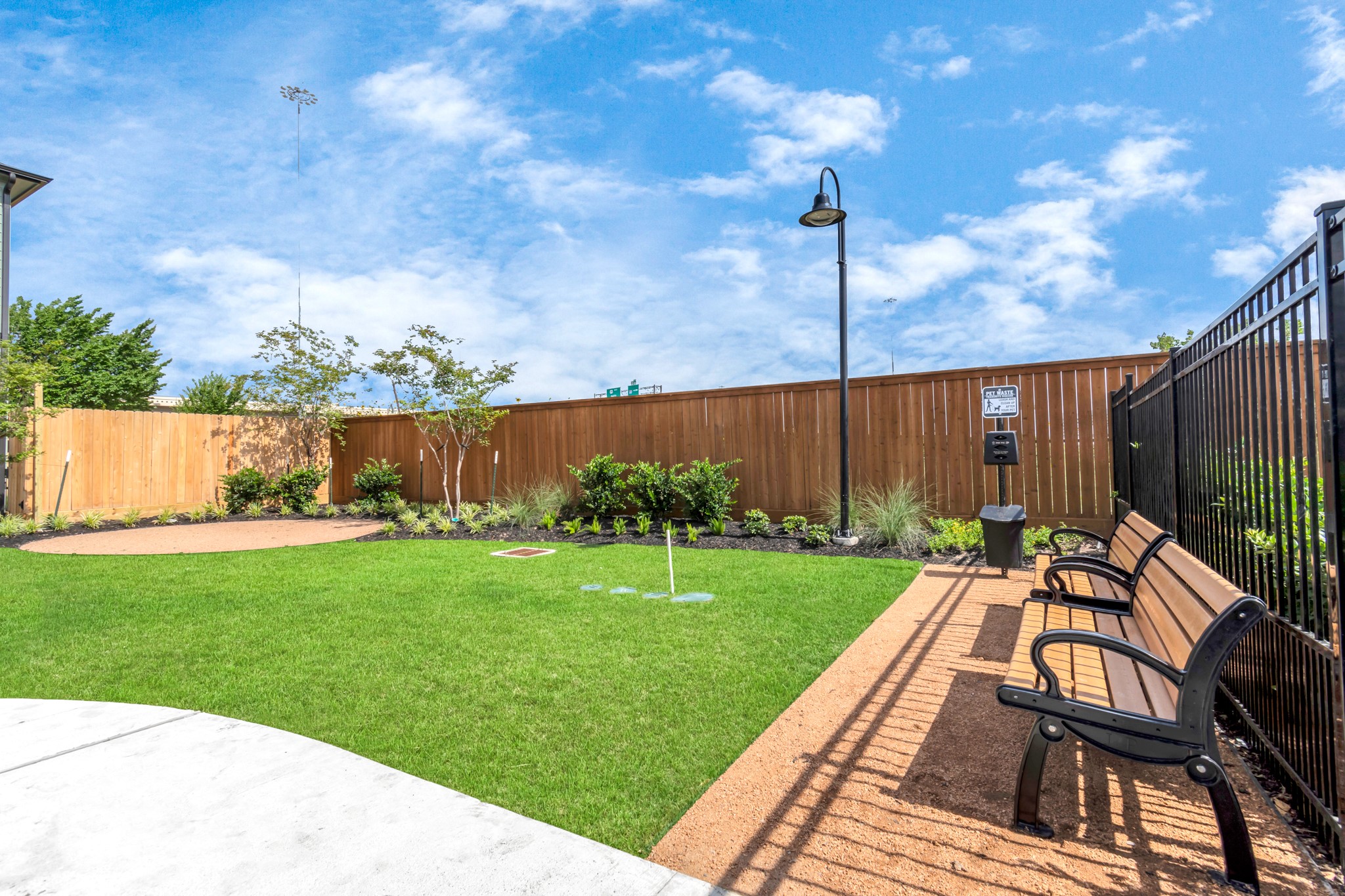 A Quaint Dog Park, as well as a Refreshing Resort-Style Pool Area,