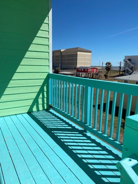 Private deck for duplex unit 2 with seawall view.