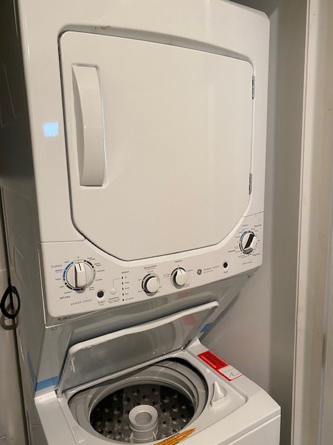 Stacked washer/dryer in duplex unit 1.