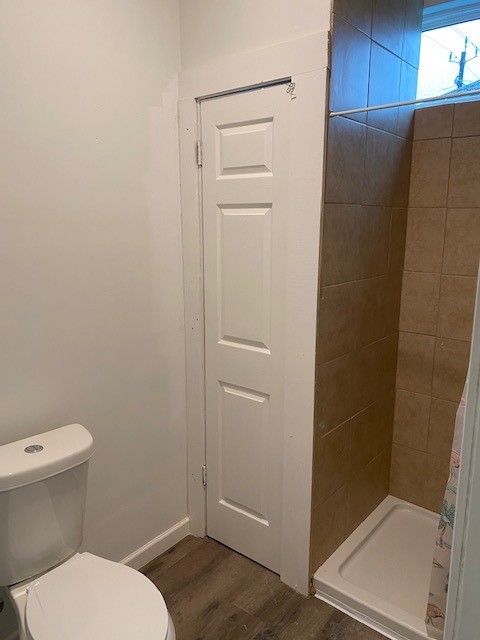 Full bath attached to bedroom in duplex unit 1.